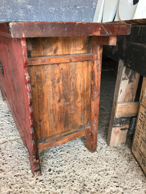 A large red Chinese temple chest