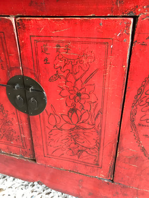 A large red Chinese temple chest