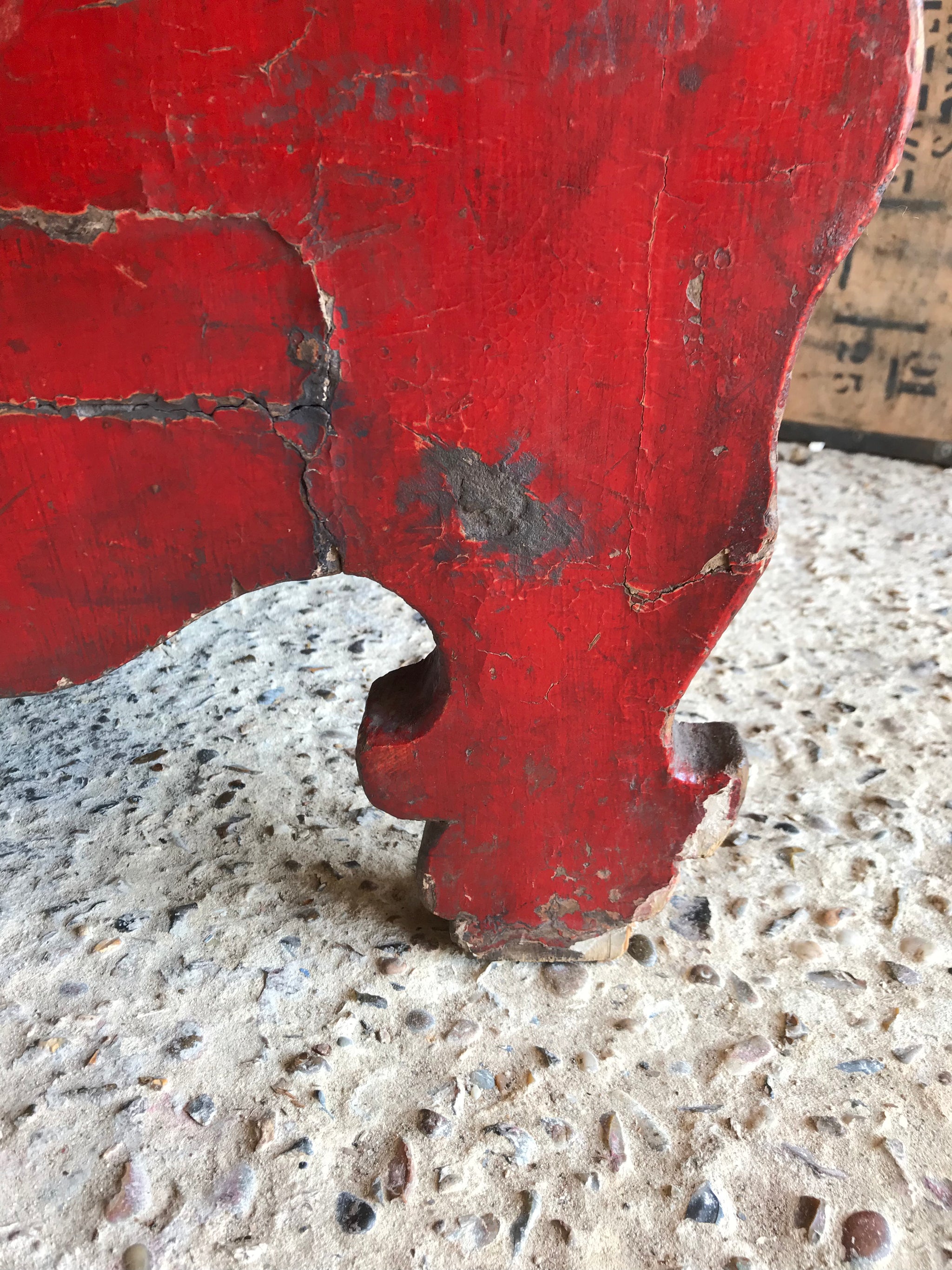 A large red Chinese temple chest