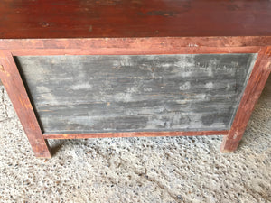 A large red Chinese temple chest