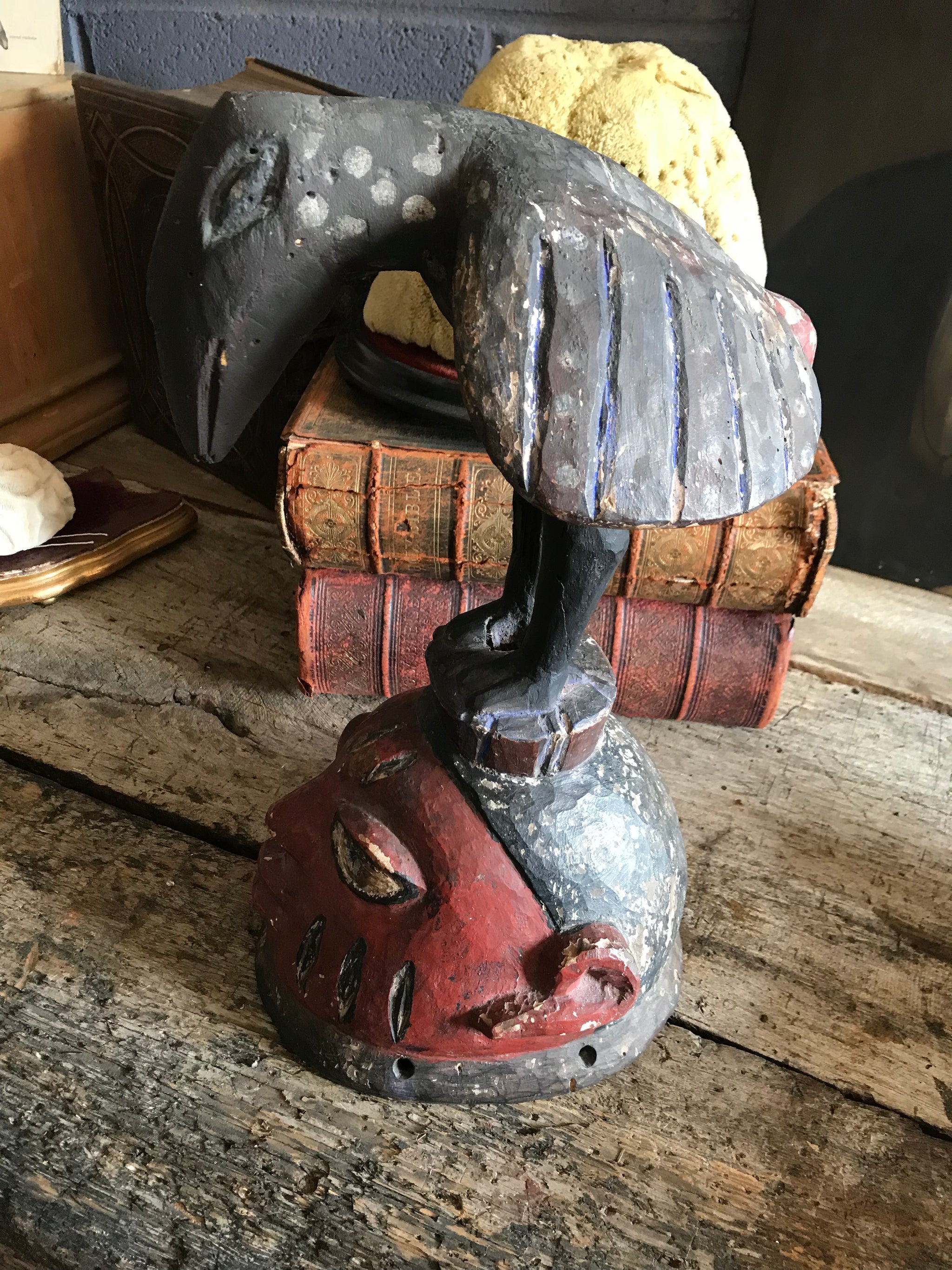 A large African tribal Yoruba Gelede bird helmet head mask