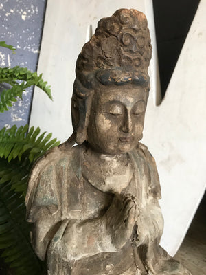 A carved wood Chinese Guanyin goddess figure