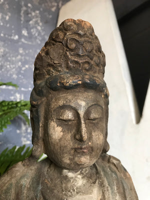A carved wood Chinese Guanyin goddess figure