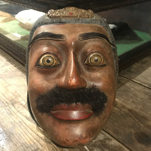 A 19th century Balinese carved wooden mask