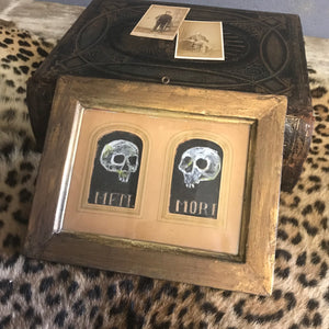 A naive Victorian style memento mori oil painting in a gilt frame