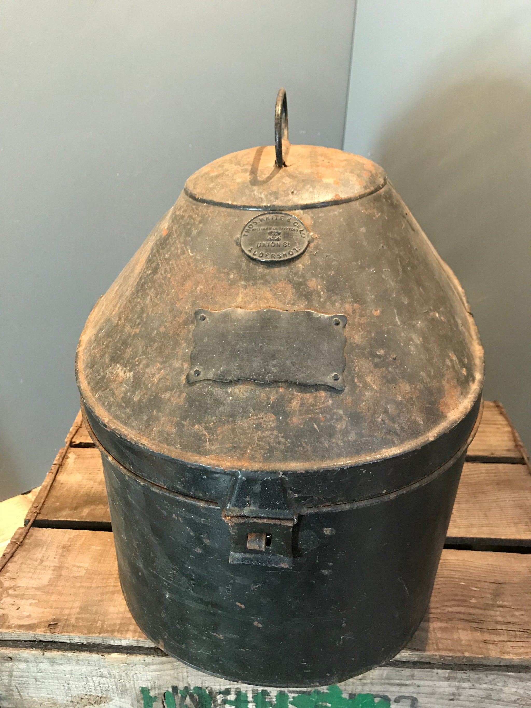 A Pair of Colonial Military Pith Helmets and Case