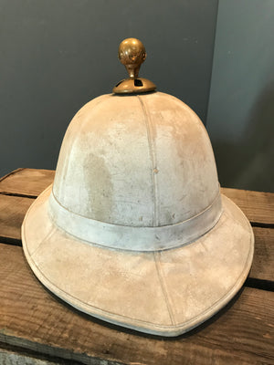 A Pair of Colonial Military Pith Helmets and Case