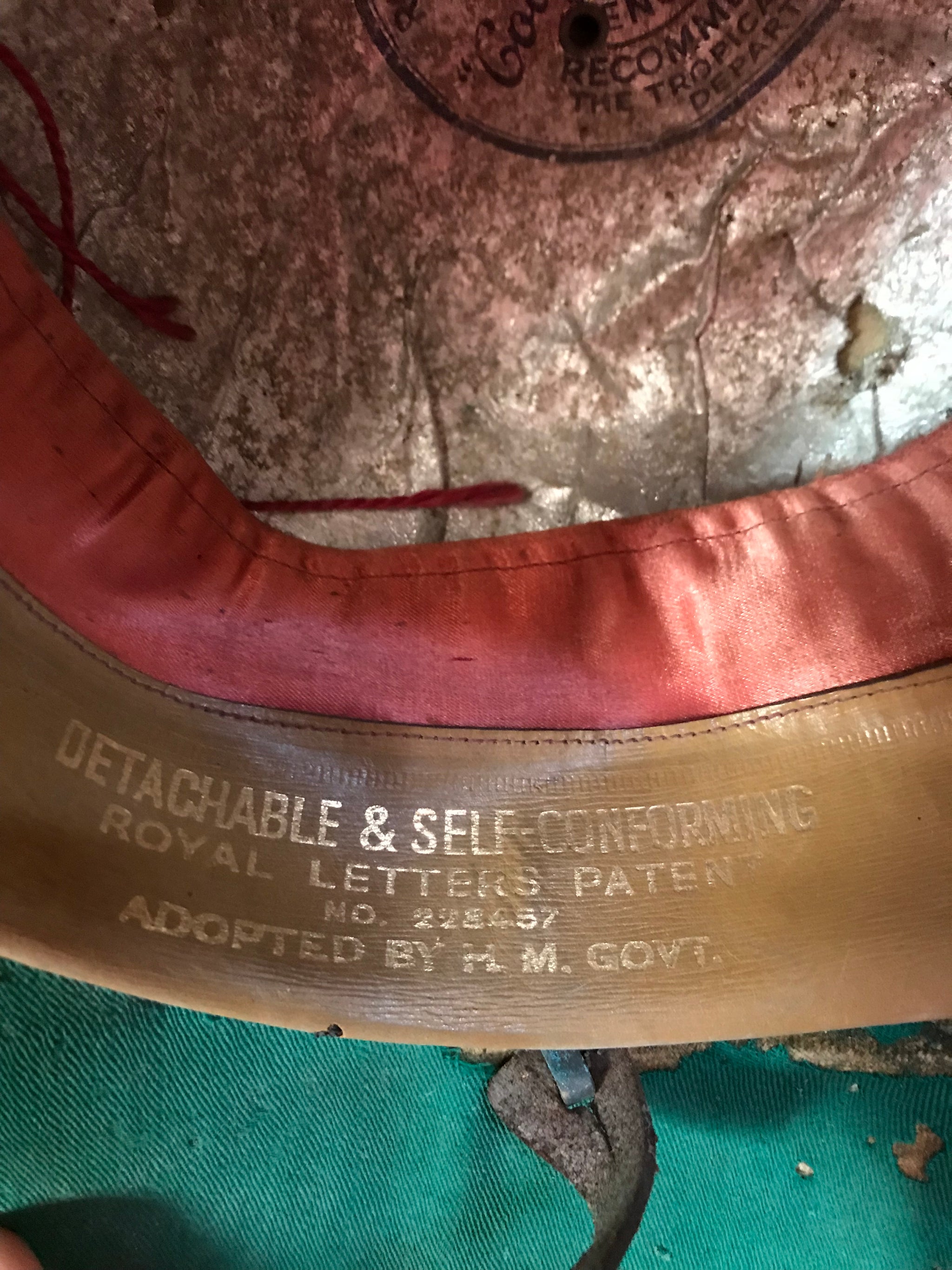 A Pair of Colonial Military Pith Helmets and Case