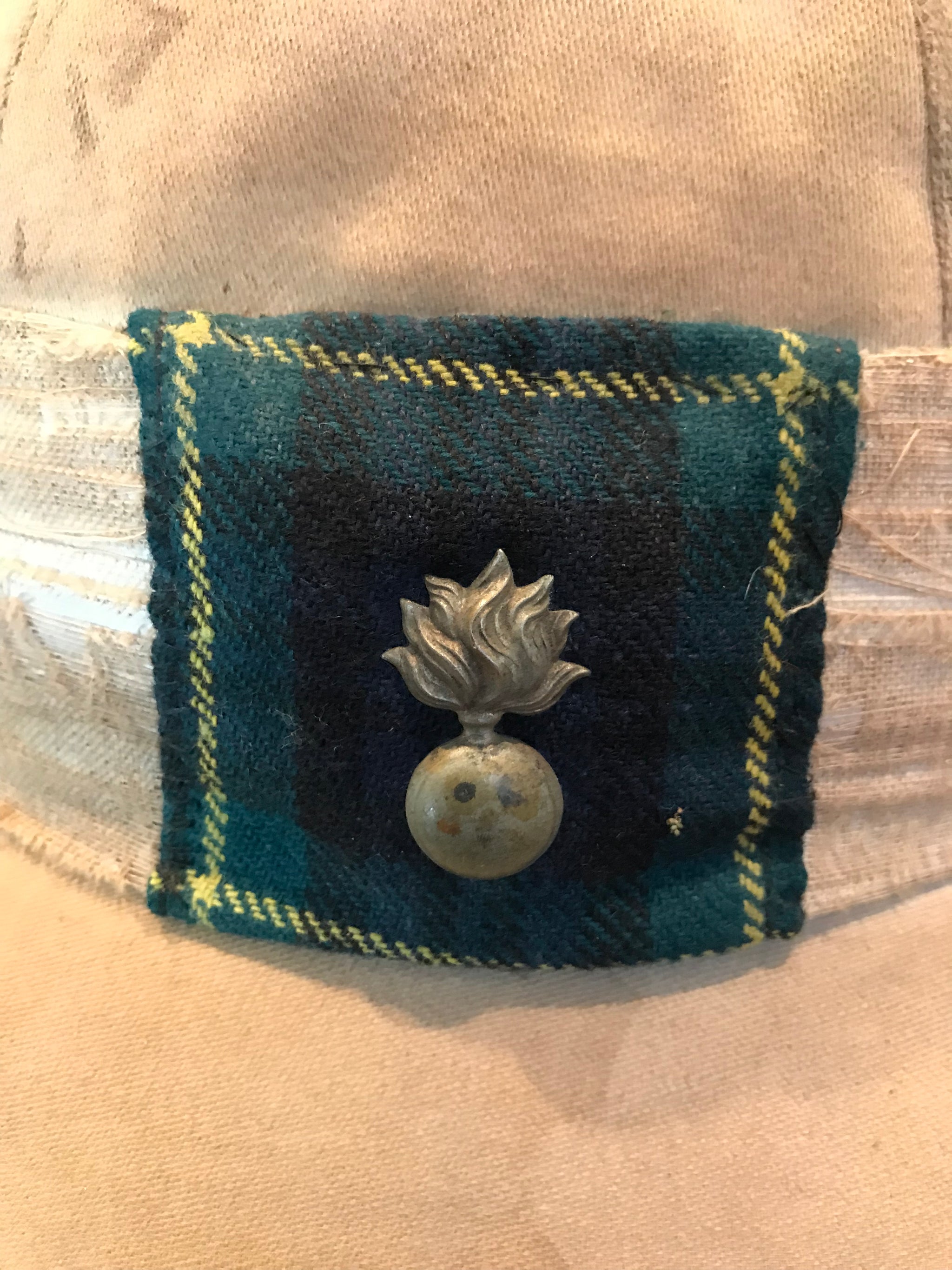 A Pair of Colonial Military Pith Helmets and Case