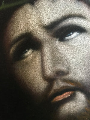 A signed religious oil painting of Jesus Christ on black velvet