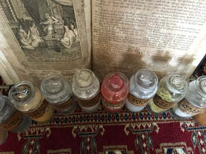 A set of 17 19th Century glass apothecary bottles or jars