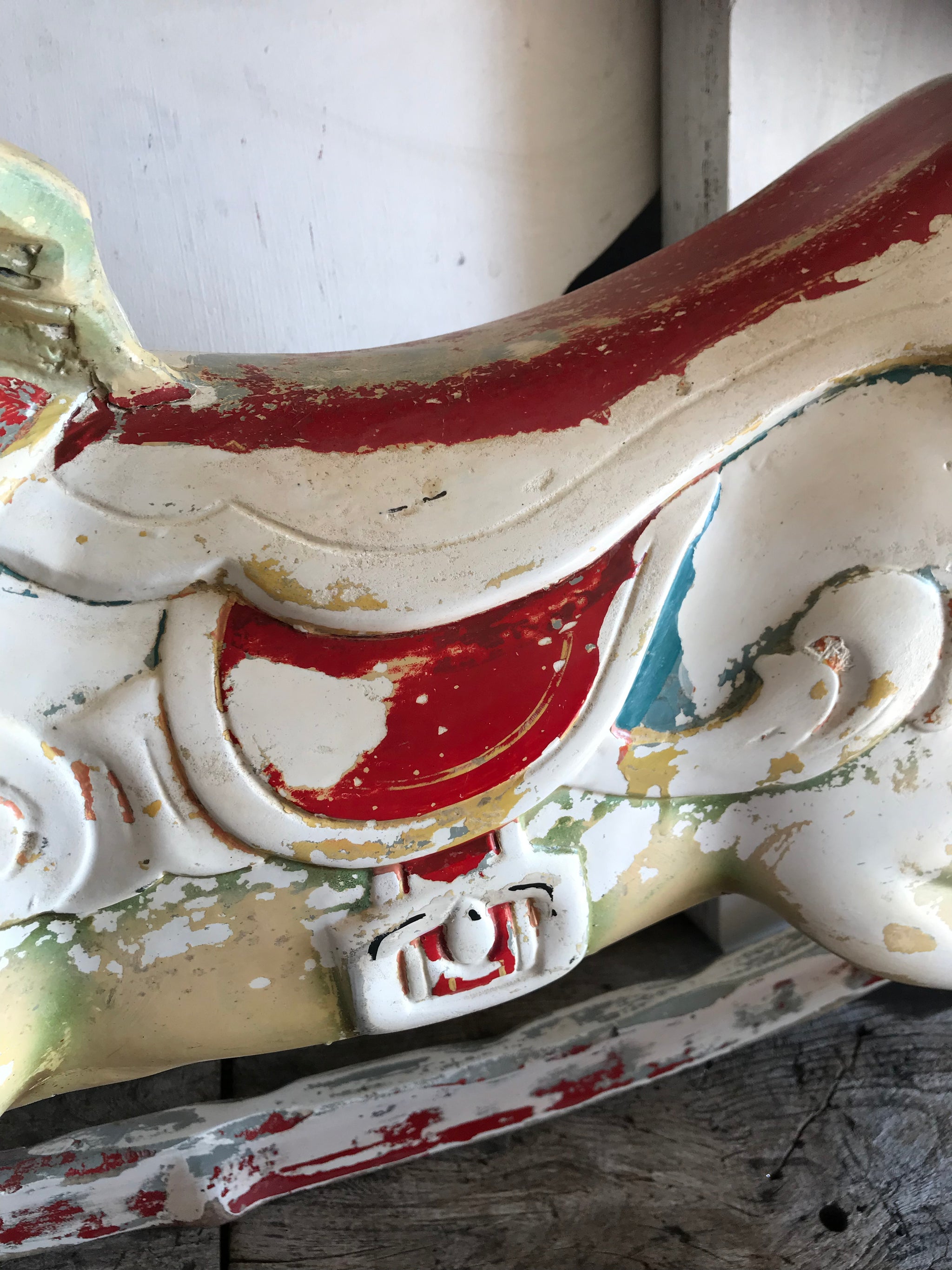 A vintage Rowlands Fun Fair carousel rocking horse
