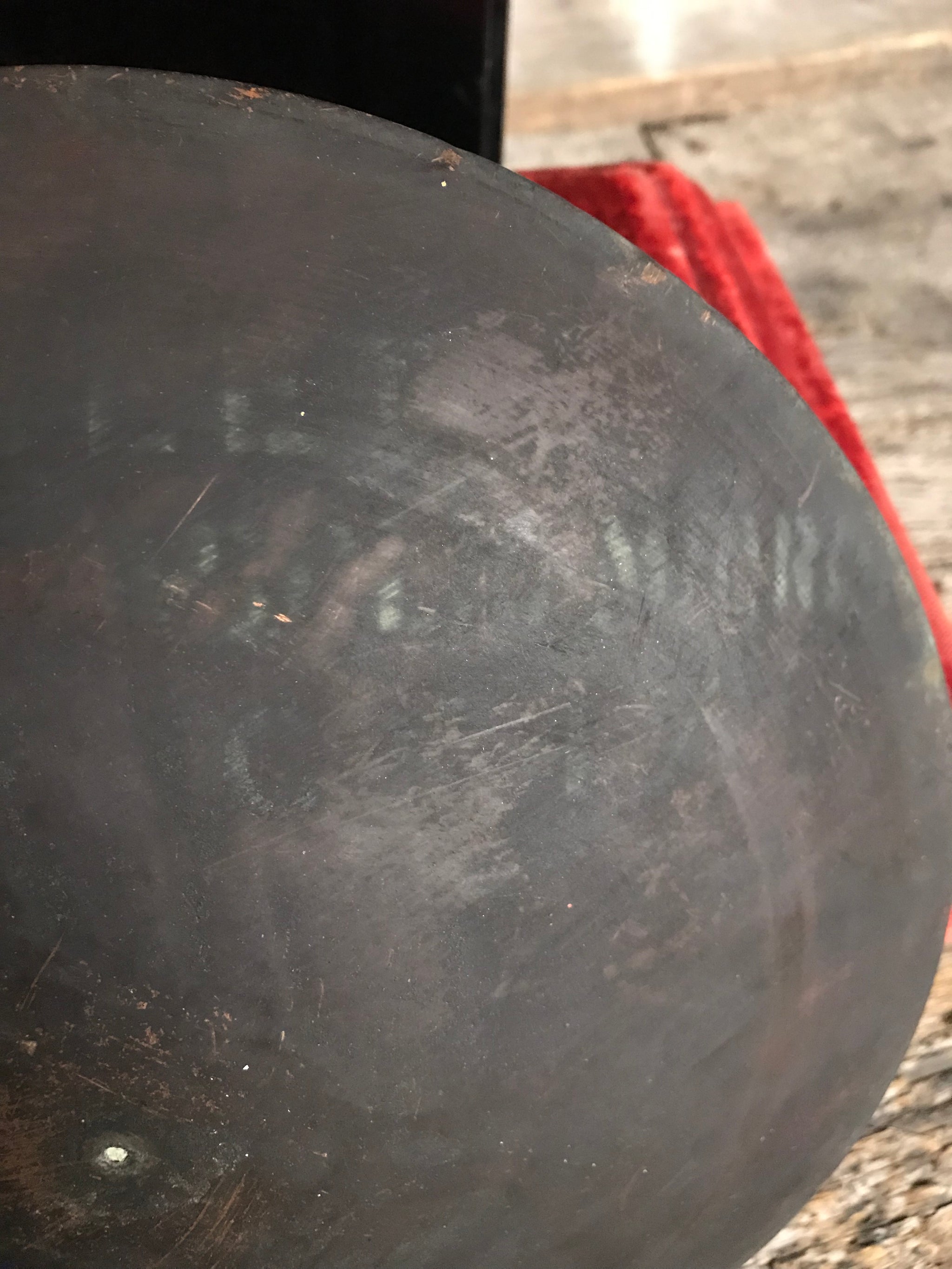 A pair of distressed parabolic mirrors