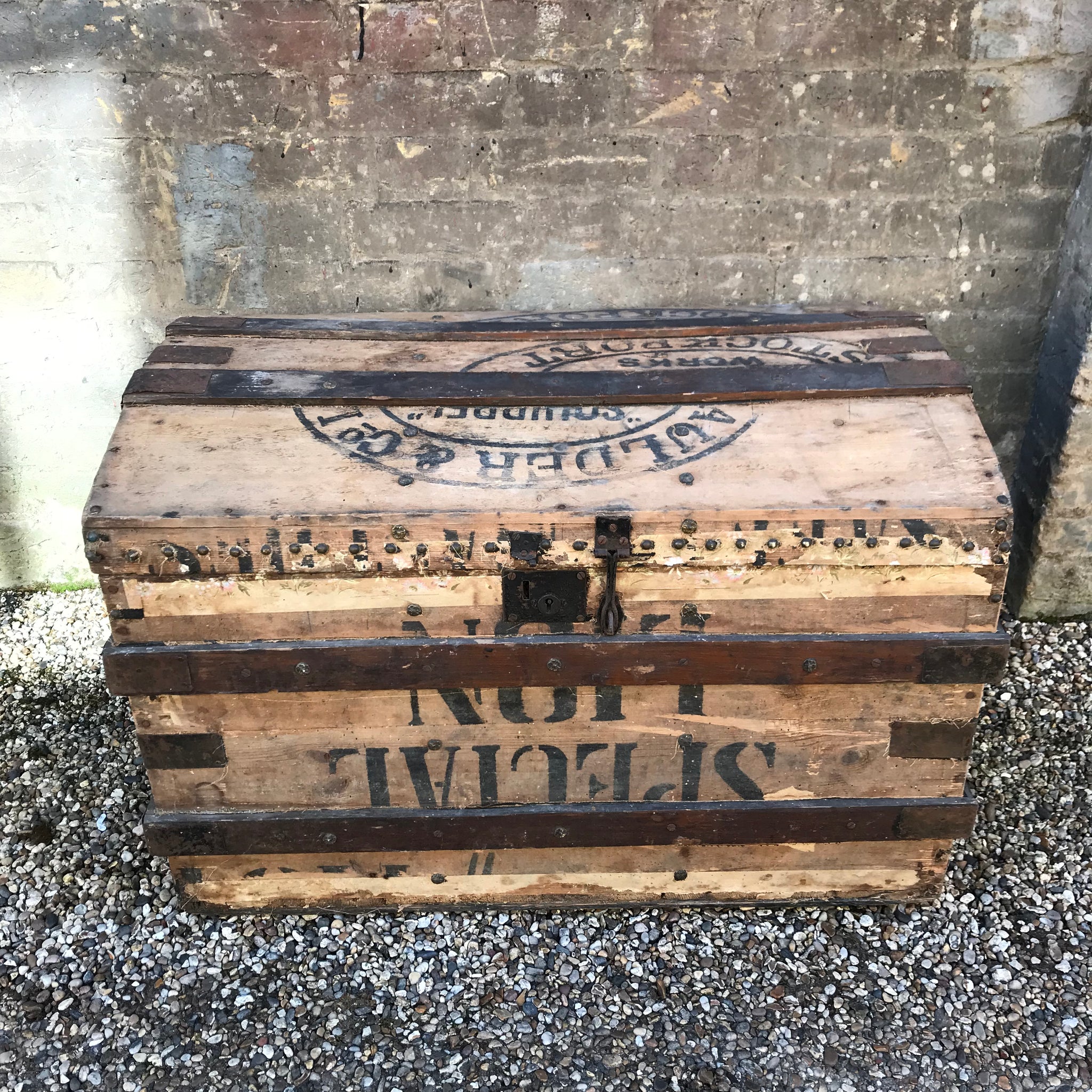A Large Stripped Wooden Trunk with Domed Top and Stud Detailing