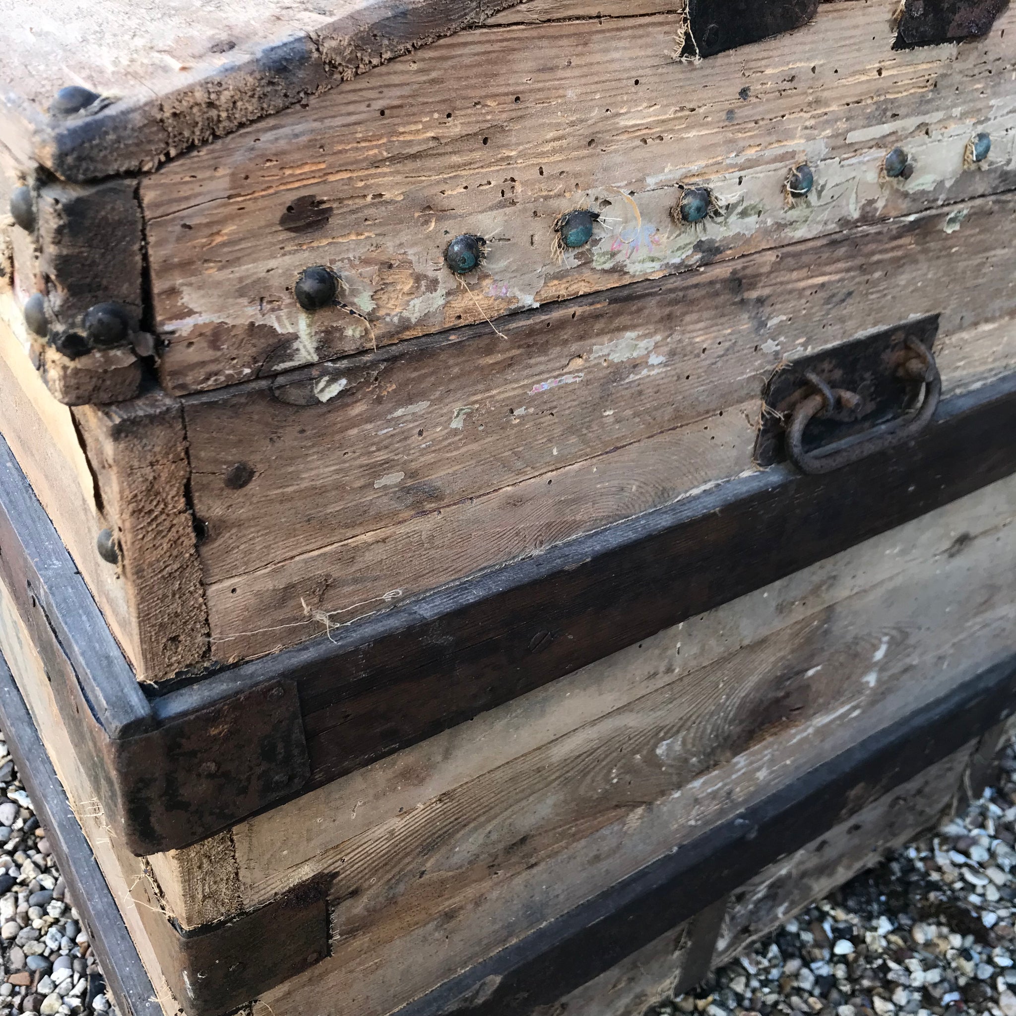 A Large Stripped Wooden Trunk with Domed Top and Stud Detailing