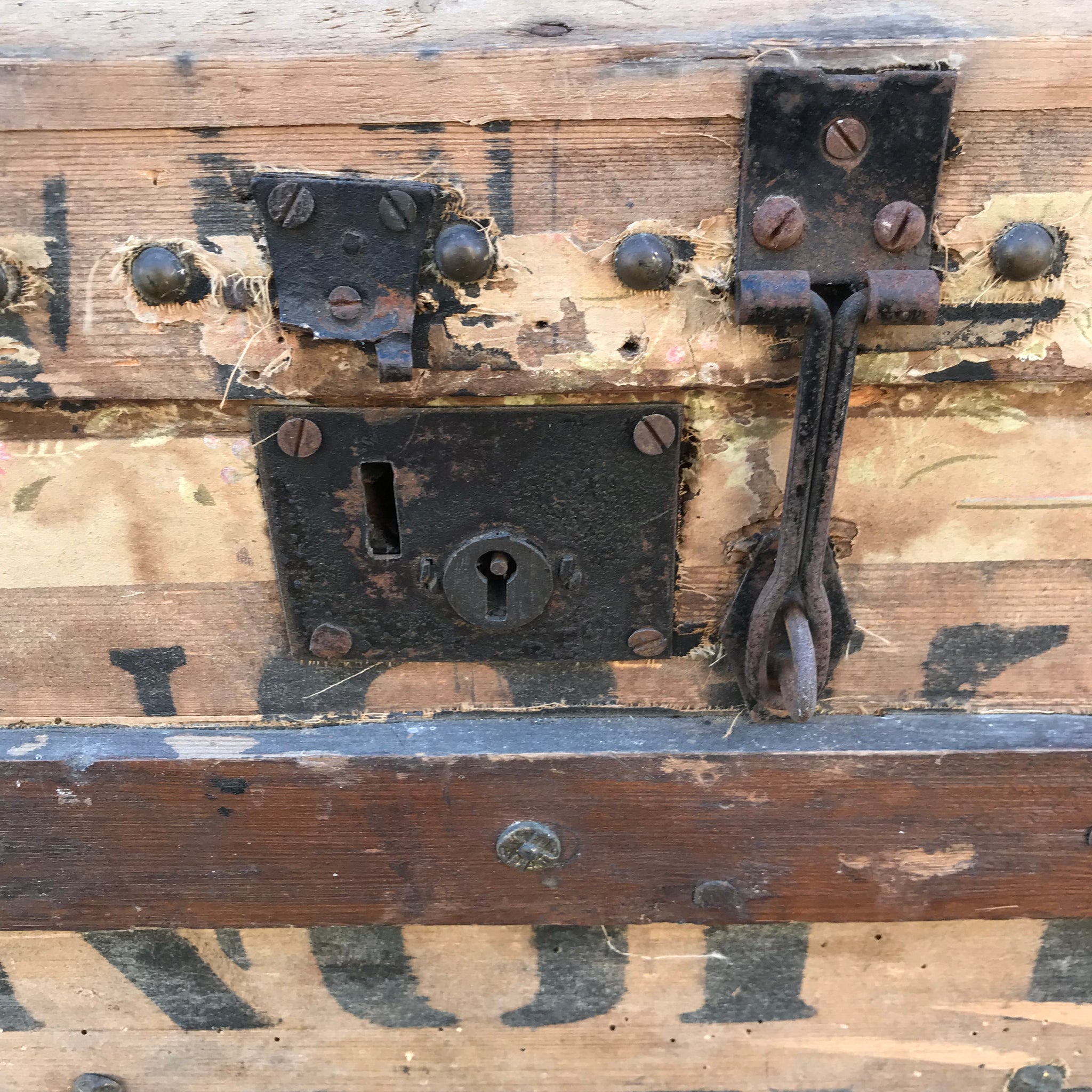 A Large Stripped Wooden Trunk with Domed Top and Stud Detailing