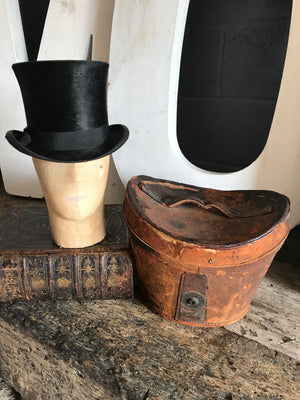 A Victorian Silk Black Top Hat And Leather Case