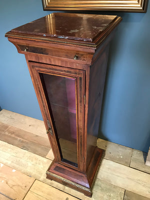 A sarcophagus shaped tapered torchere boulle pedestal display cabinet with key