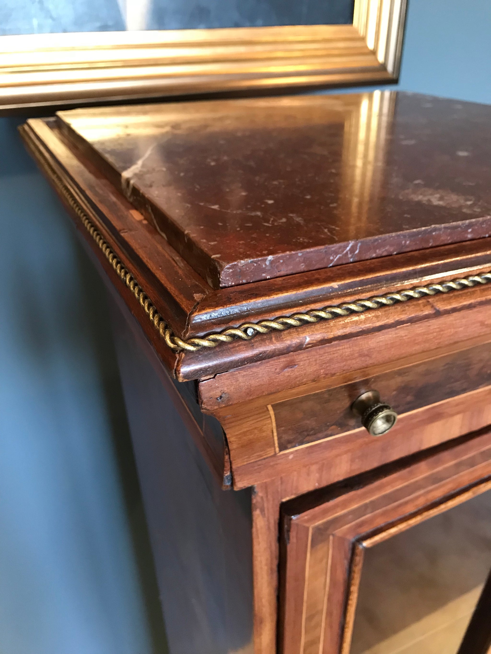 A sarcophagus shaped tapered torchere boulle pedestal display cabinet with key