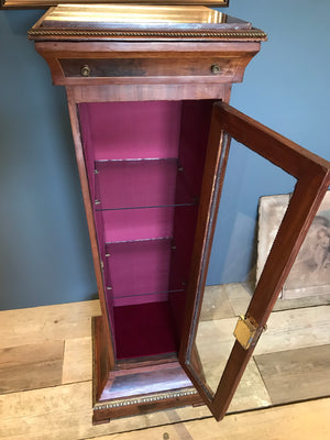 A sarcophagus shaped tapered torchere boulle pedestal display cabinet with key