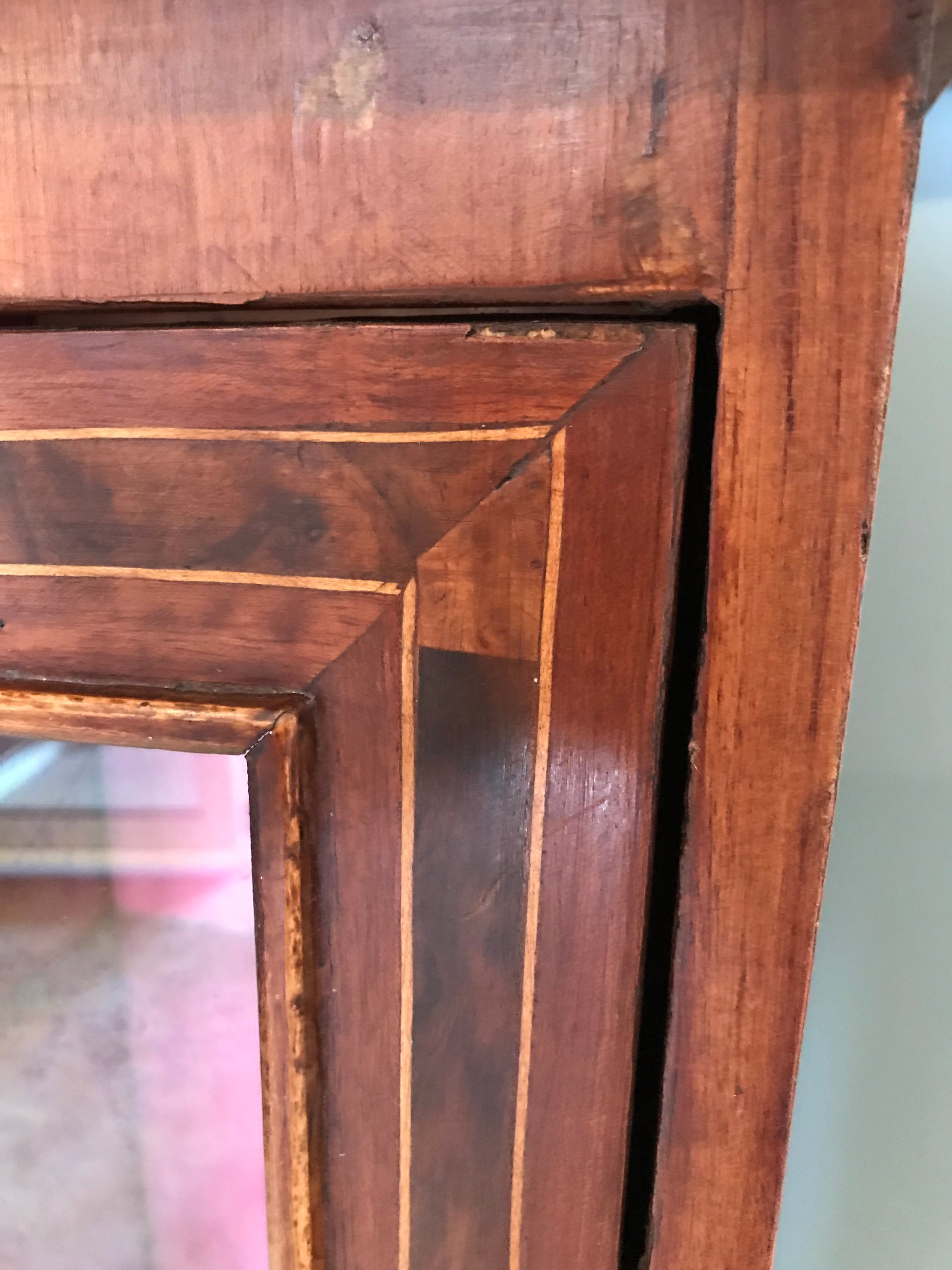 A sarcophagus shaped tapered torchere boulle pedestal display cabinet with key