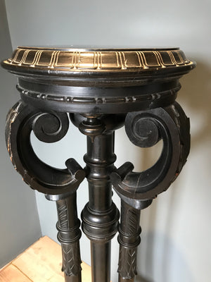 A Gothic goat hoof ebonised jardiniere plant display stand
