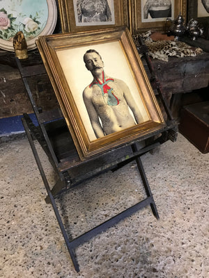 An unusual and rare wooden floor standing rack easel