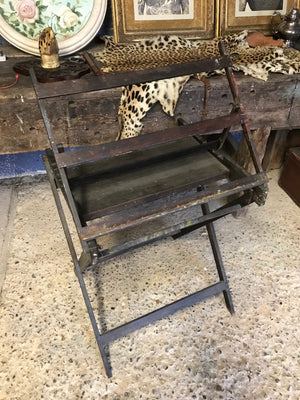 An unusual and rare wooden floor standing rack easel