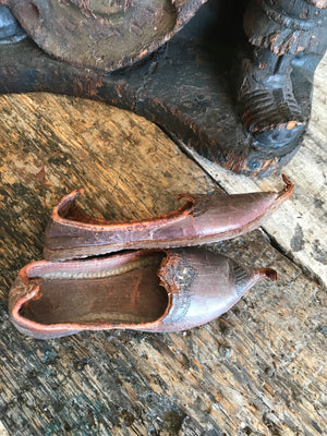 A pair of 19th Century leather Middle Eastern child's shoes