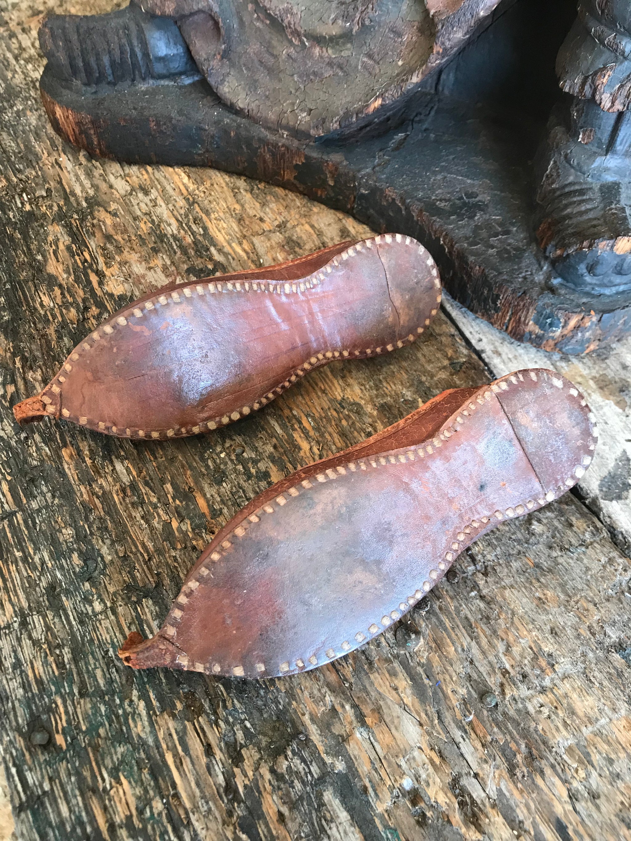 A pair of 19th Century leather Middle Eastern child's shoes