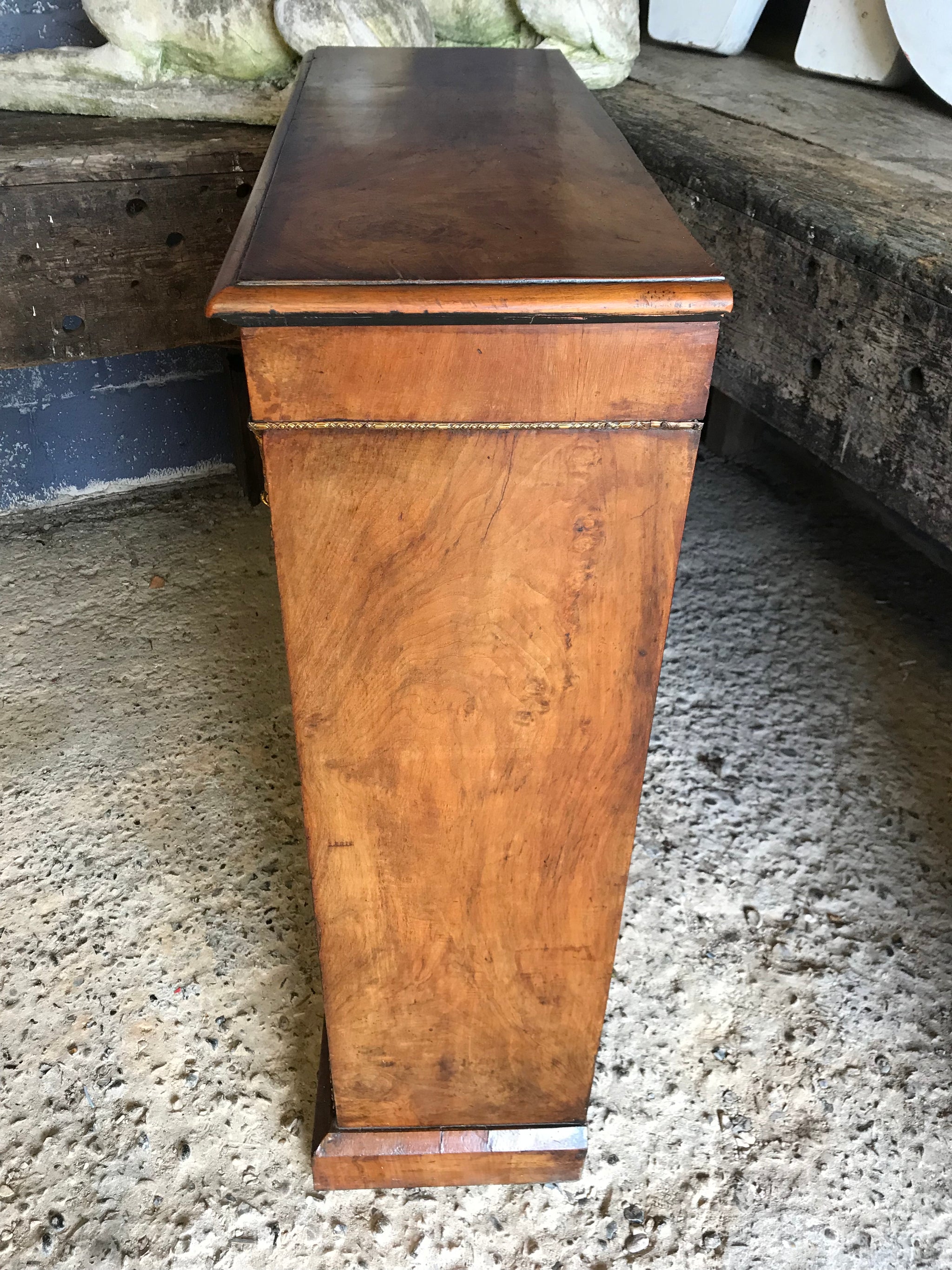 A Victorian single door inlaid walnut pier display cabinet