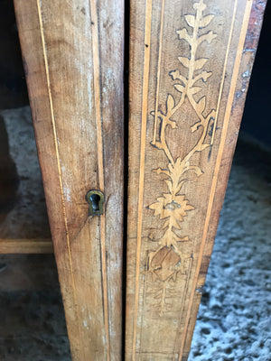 A Victorian single door inlaid walnut pier display cabinet