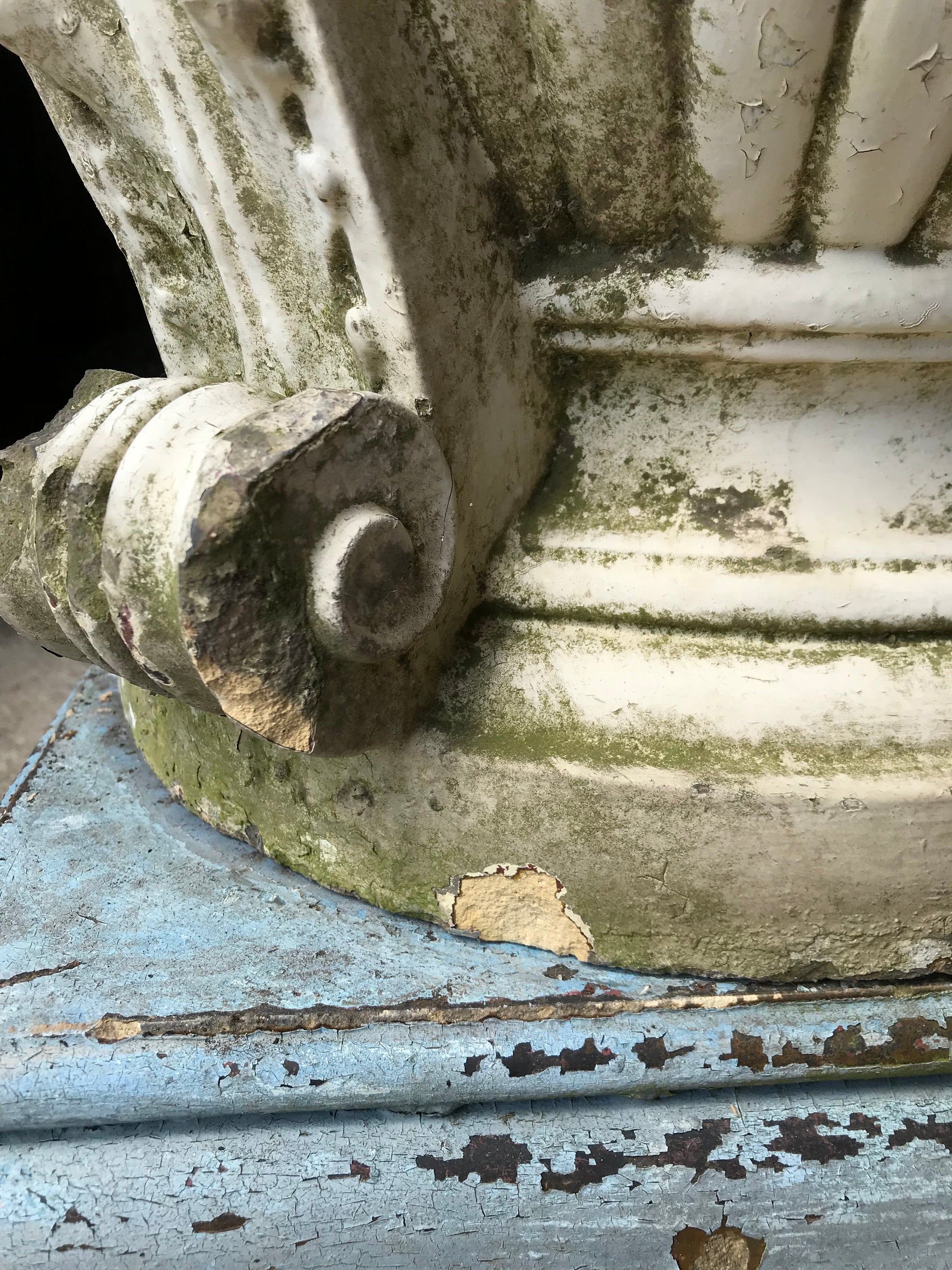 A large terracotta country house urn on plinth