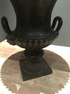 A 19th century black cast iron garden urn