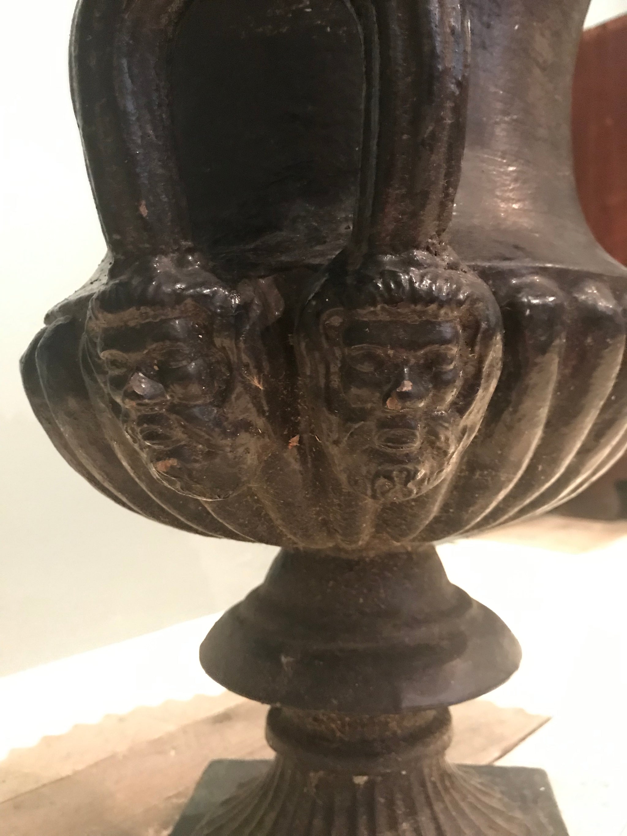 A 19th century black cast iron garden urn