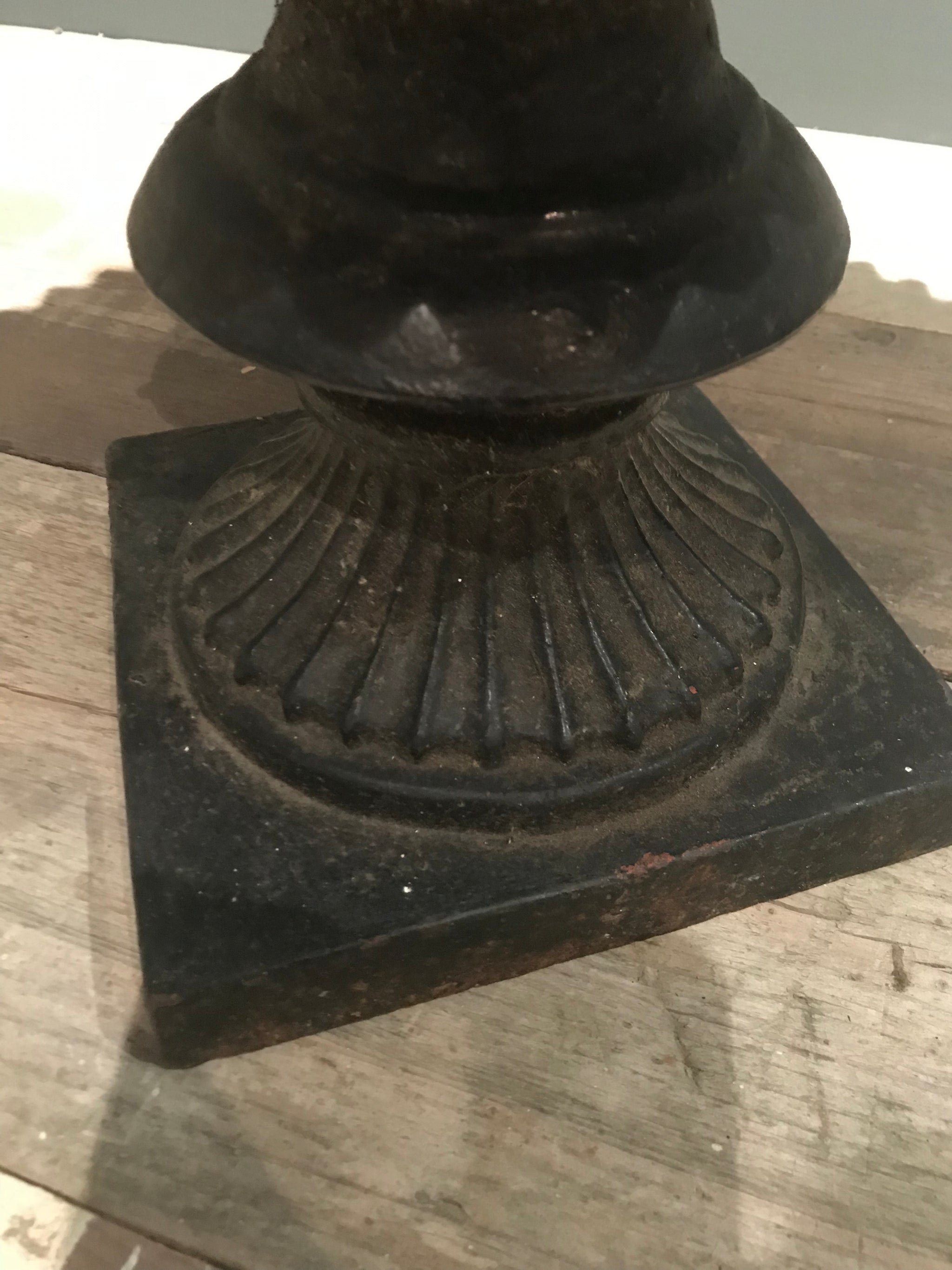 A 19th century black cast iron garden urn