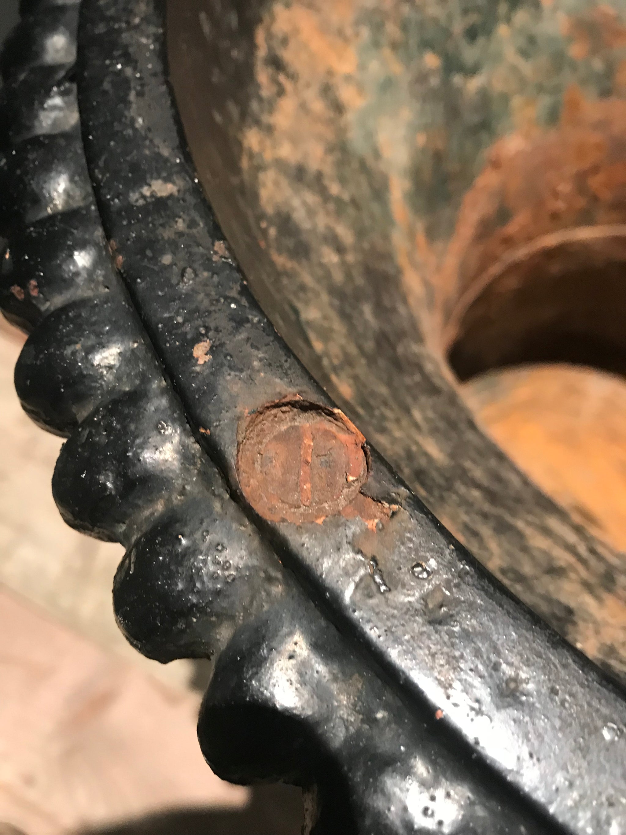 A 19th century black cast iron garden urn