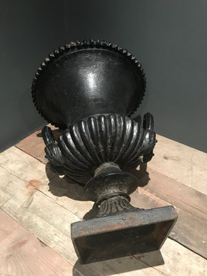 A 19th century black cast iron garden urn