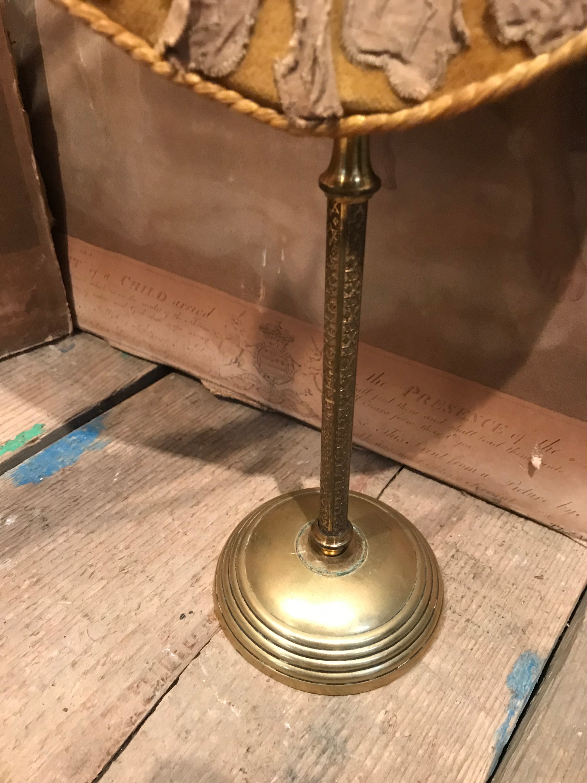 A pair of velvet face screens on brass stands