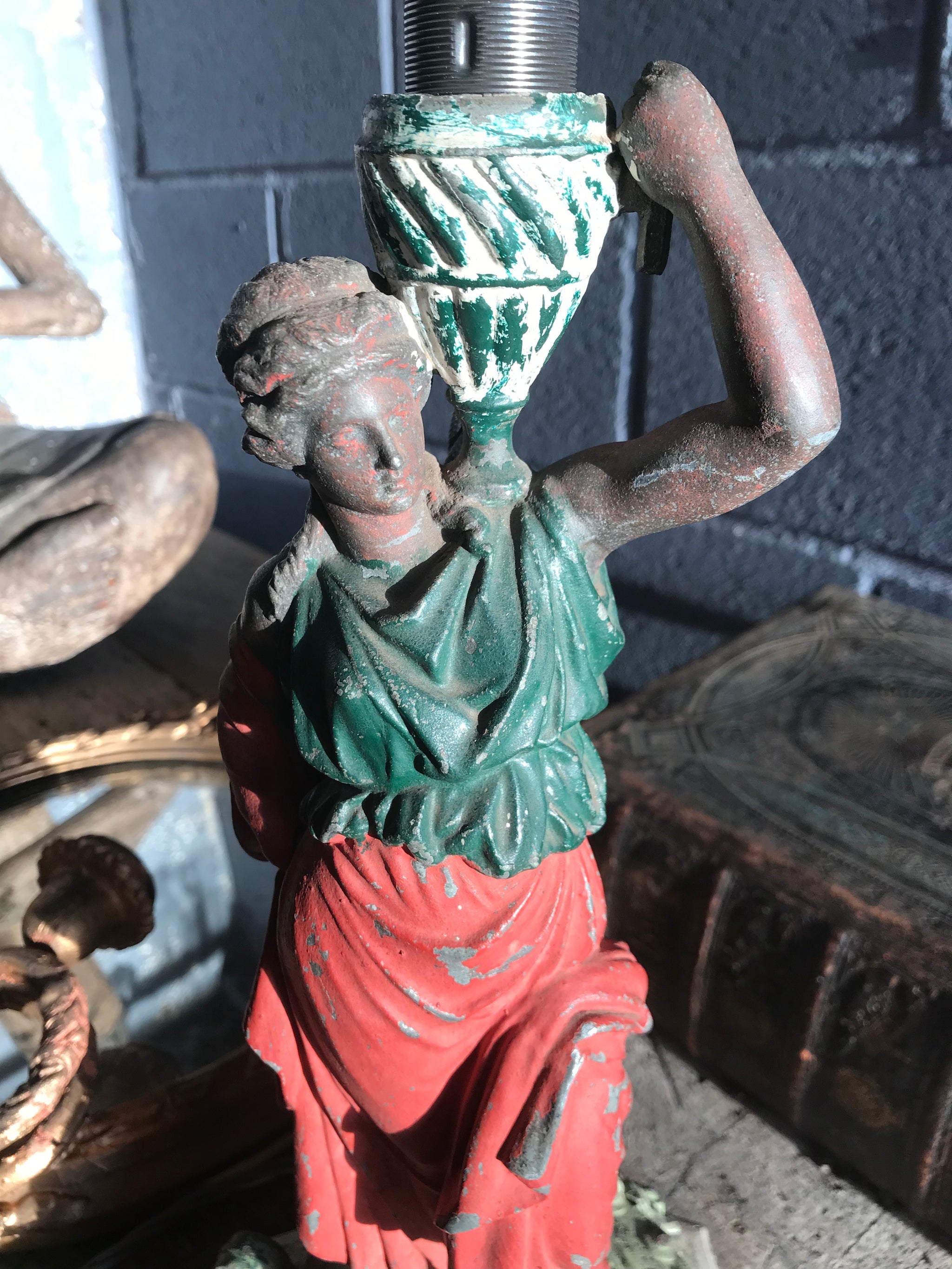 A cold painted spelter figural lady lamp