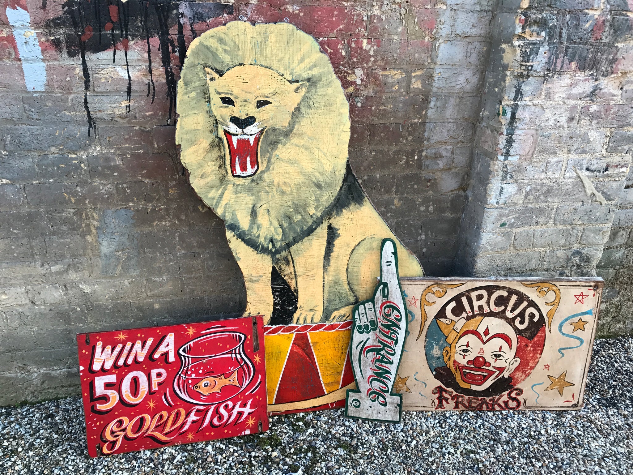 A hand painted ‘ringmaster’ circus lion fairground panel