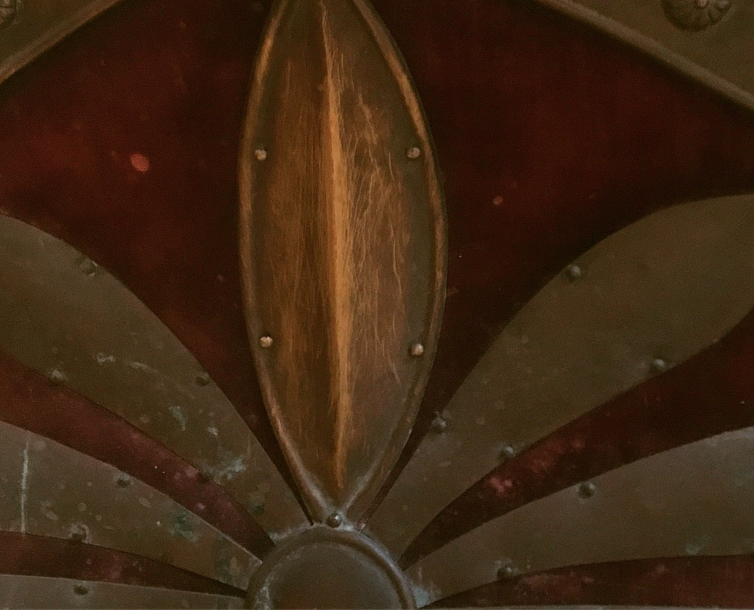 A red velvet and worked metal horse saddle