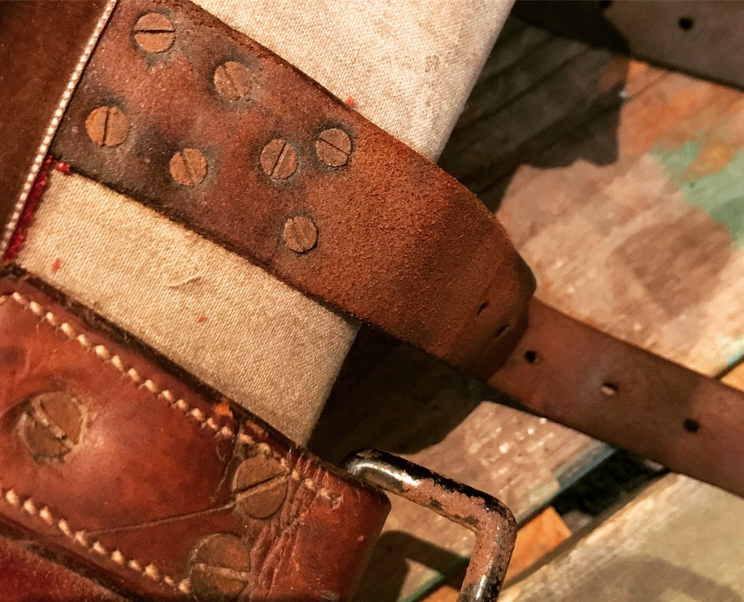 A red velvet and worked metal horse saddle