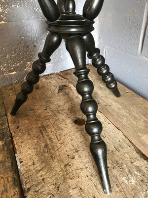 An early ebonised bobbin gypsy table with red velvet top