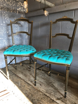 A pair of 19th Century ebonised turquoise button seat side chairs