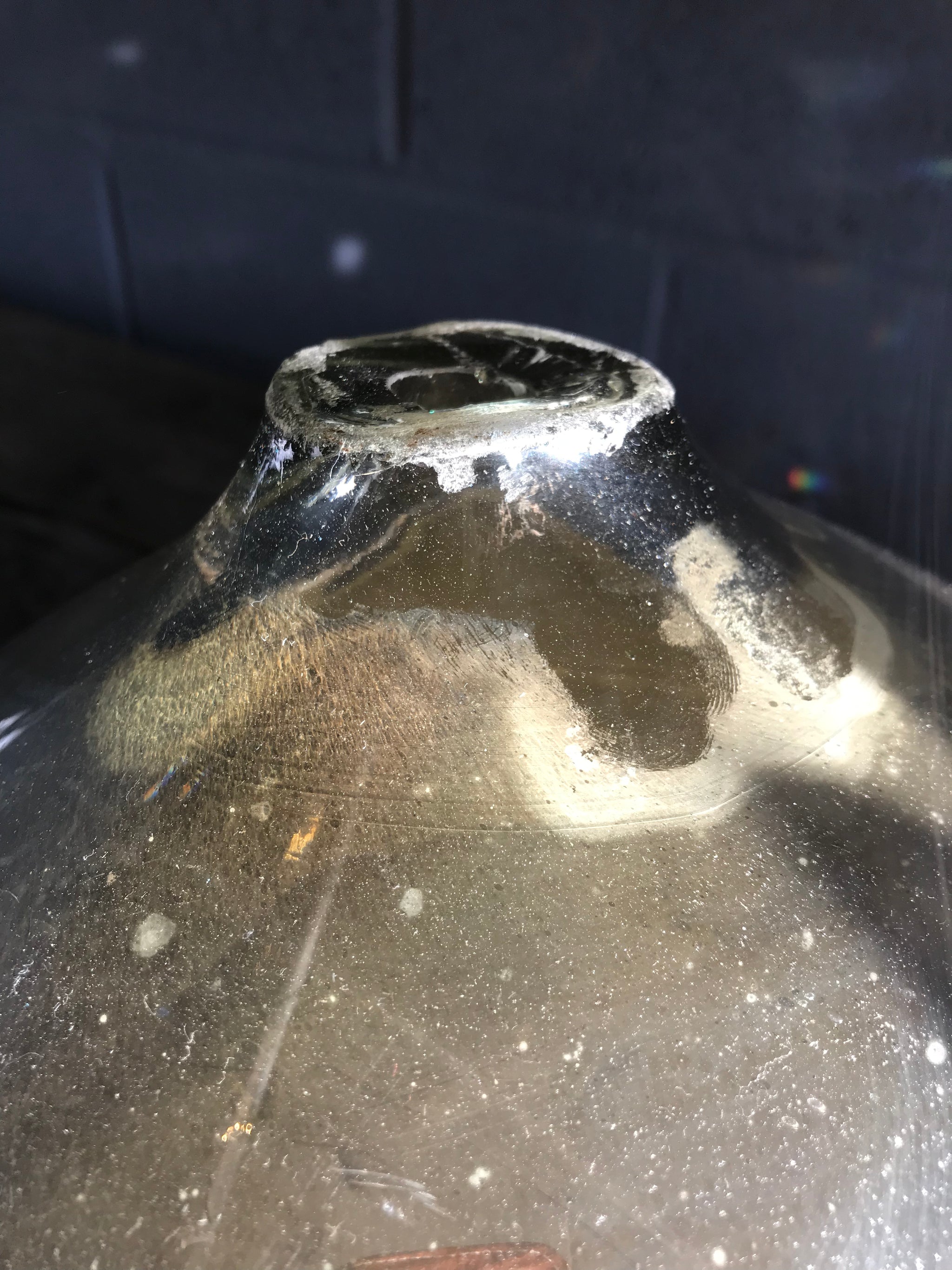 A very large silver mercury glass witches ball