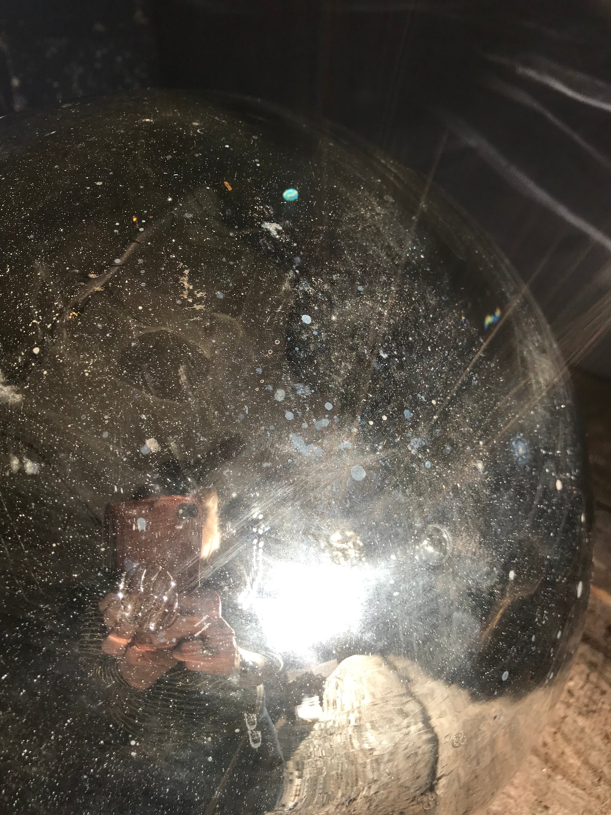 A very large silver mercury glass witches ball