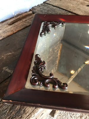 A large Victorian ornate mahogany overmantle mirror