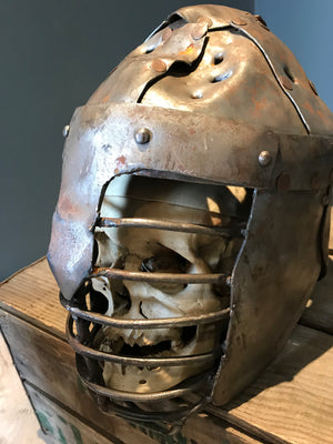 A metal re-enactment armour helmet for a warrior or knight