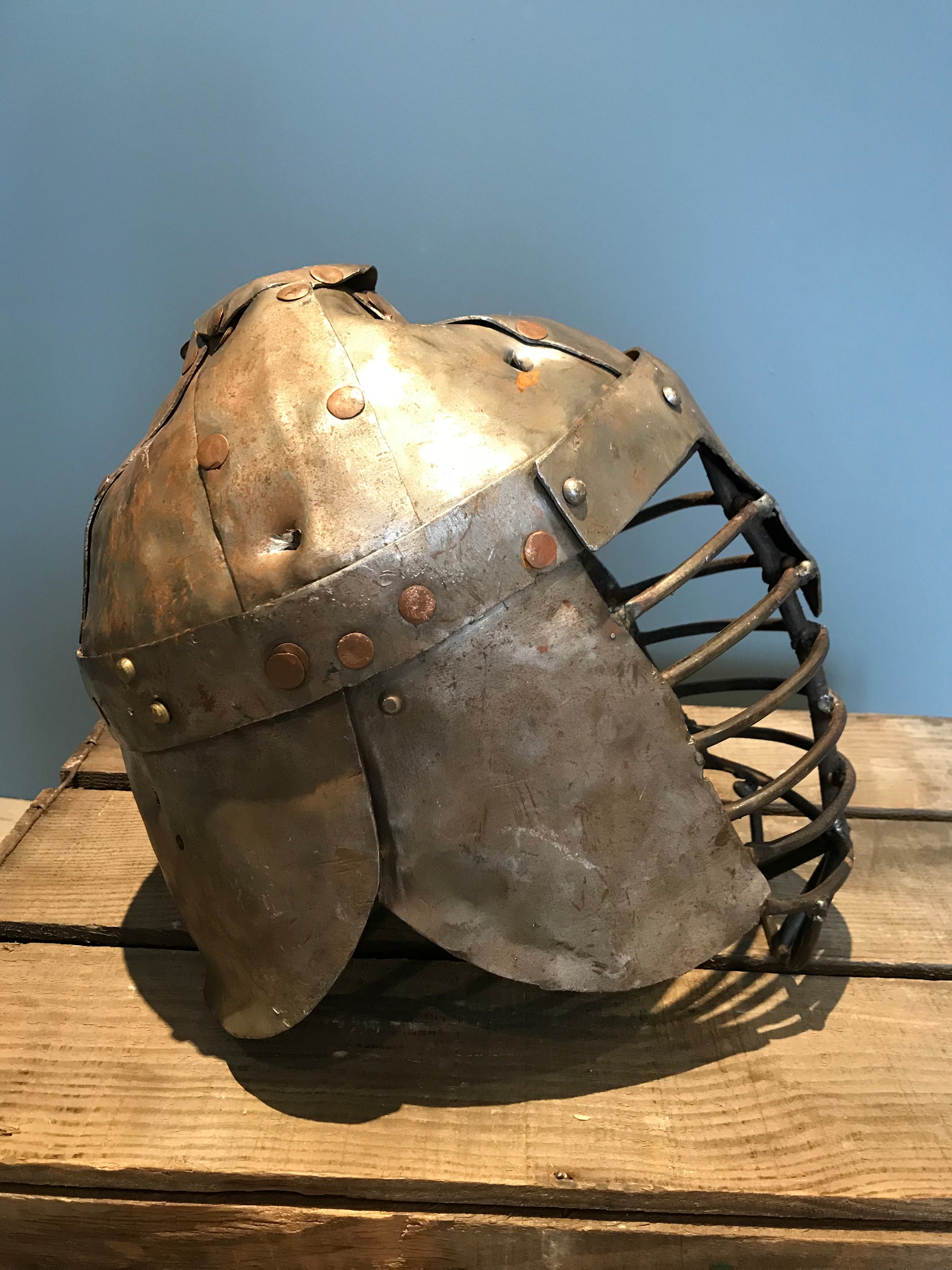 A metal re-enactment armour helmet for a warrior or knight
